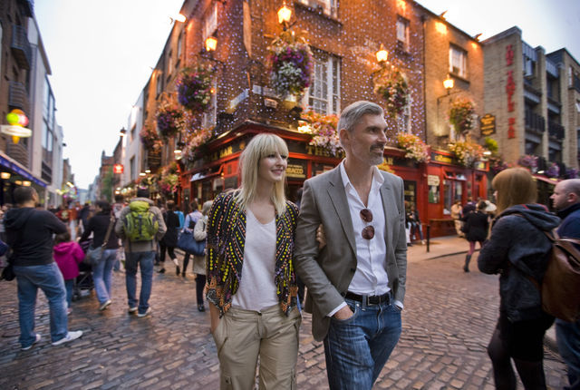 couple walking around a city