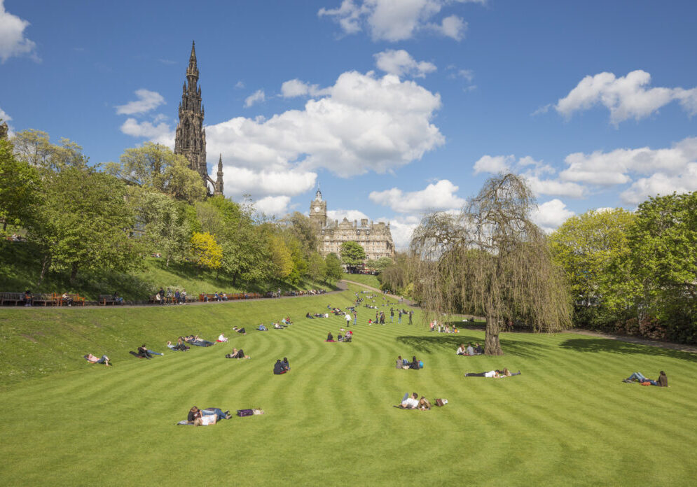 People enjoying the sun in Princes Street Gardens (East)